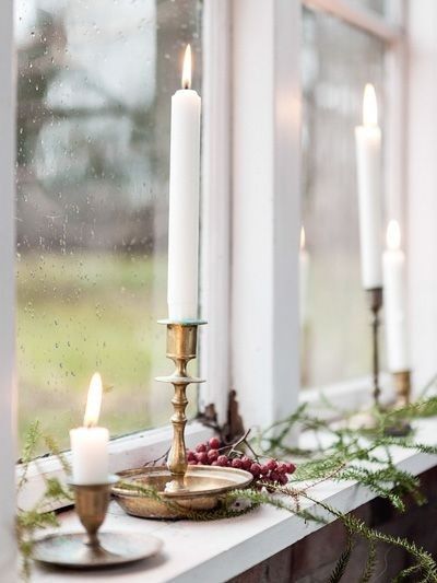 candele natalizie finestre
